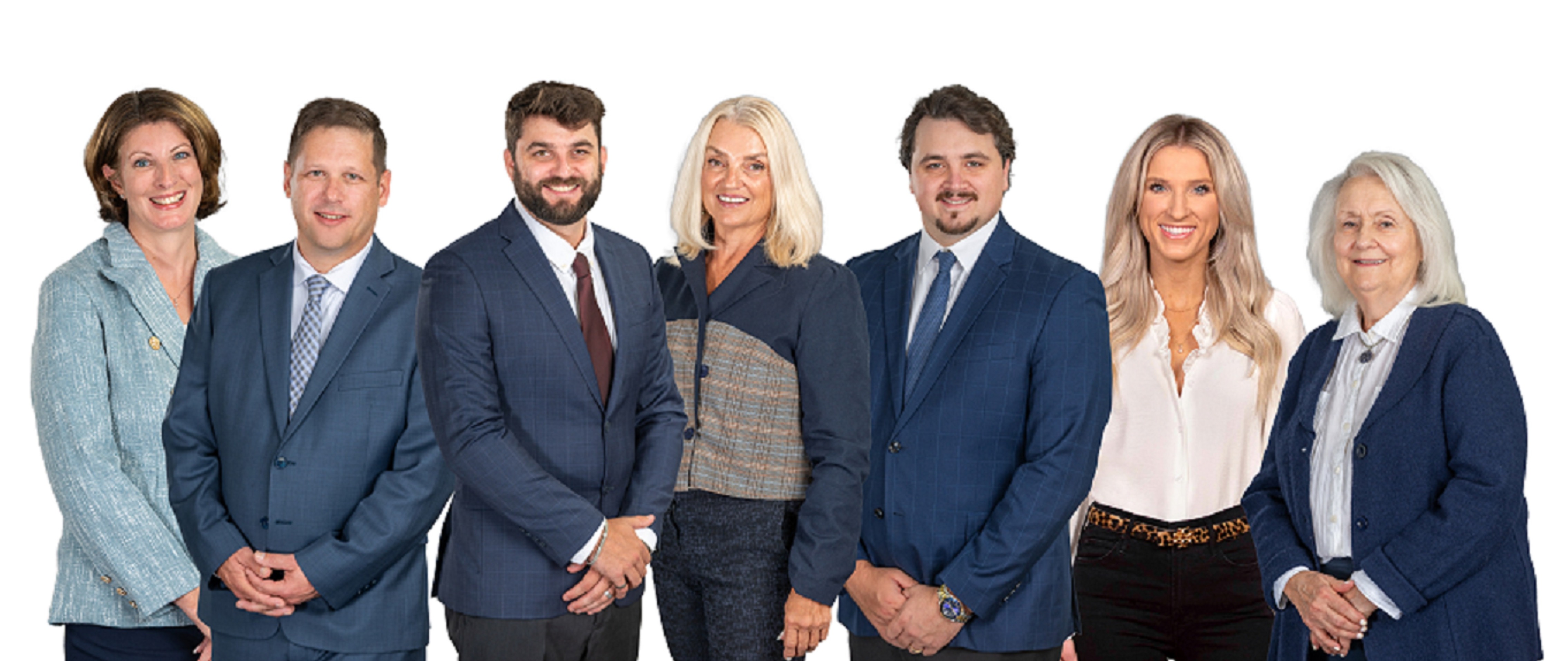 three women and four men in dark attire in front of thrivent logo