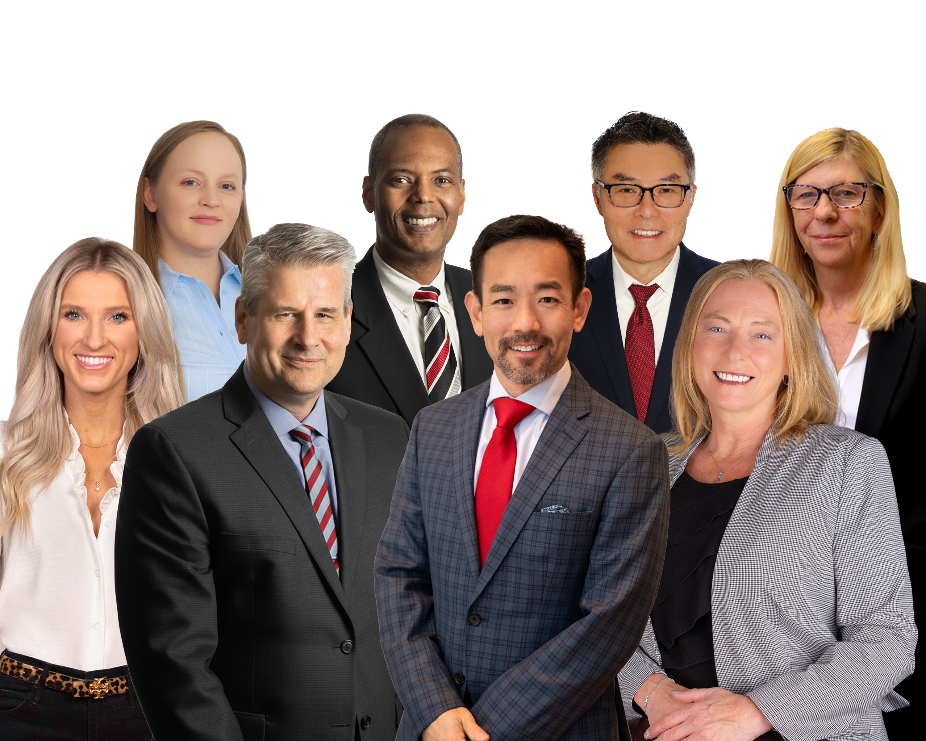 Three men and four women in professional clothing, smiling at the camera