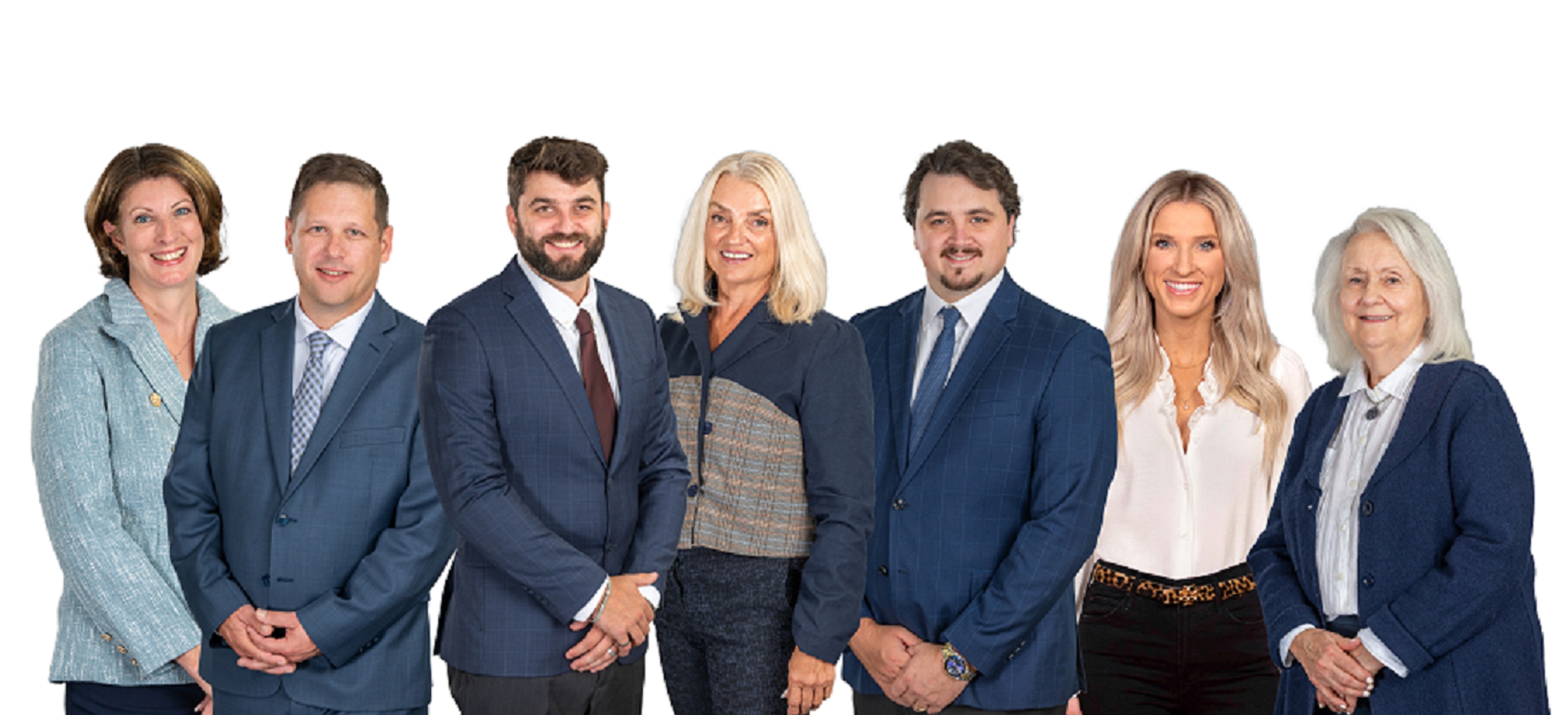 four women and three men in business attire